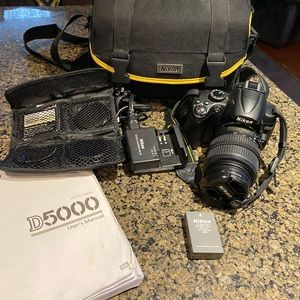 DSLR Nikon camera with accessories